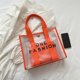thumbnail image 1 of Bolsa de hombro para mujer Bolsas de viaje transparentes de PVC de moda con billetera (naranja) Hugtrwg Para Estrenar, 1 of 9