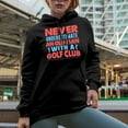 thumbnail image 2 of Never Underestimate an Old Man with a Golf Club, Golf Player, Golfing or Golfer Themed Merch Gift, Black Hooded Sweatshirt or Hoodie, Small, 2 of 5