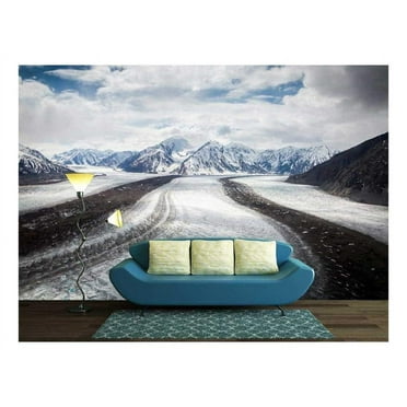 wall26 - Snow Covered Mountains Under Cloudy Sky - Removable Wall Mural | Self-Adhesive Large Wallpaper - 66x96 inches
