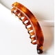 thumbnail image 1 of Fiudx Pinza para El Pelo Coreana, Elegante Pinza Grande Tipo Banana, Accesorio Antideslizante Versátil, Diseño Metálico Fluido y Elegante, Ideal para Banquetes de Boda, Regalo Perfecto para Mujeres., 1 of 2