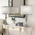 thumbnail image 2 of 26.75" Mirrored Polished Chrome Table Lamp Set ft. Curvy Seamless Hourglass Body and Natural Linen Drum Shade with Satin Silver-Edged Studded Self Trim (Set of 2), 2 of 5