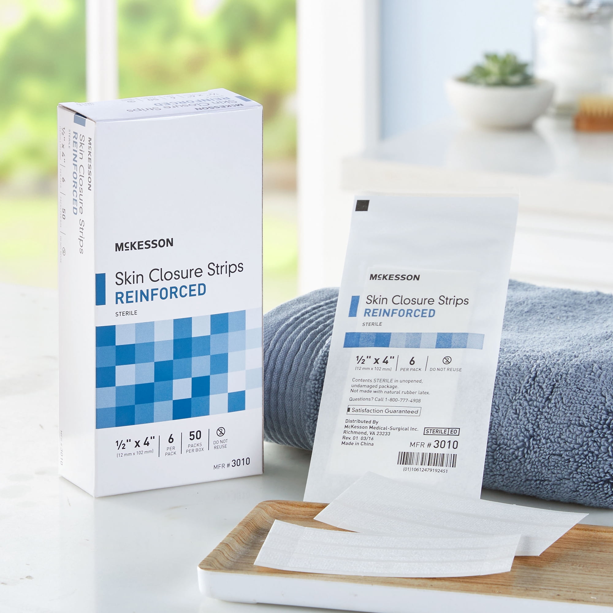 McKesson Skin Closure Strips - Sterile, Reinforced Wound Bandage, 1/2 in x 4 in, 50 Ct