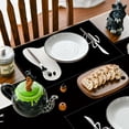 thumbnail image 4 of Juego de 4 manteles individuales para mesa de comedor con diseño de tiras de Halloween, 4 of 5