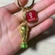 thumbnail image 3 of 2 llaveros con trofeo 3D de la Copa Mundial de la FIFA 2022: posee una versión coleccionable del premio de fútbol más grande del mundo, recuerdos de la Copa del Mundo brillar Electrónica, 3 of 5