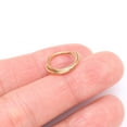 thumbnail image 3 of Pure24K Implant Grade Titanium Double Crossing Layer Clicker Hoop Ring, 3 of 5