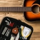 thumbnail image 2 of Kit de reparación de guitarra 1pc Guitarra portátil Limpieza de guitarra Kit de reparación Kit de emergencia de reparación (negro), 2 of 5