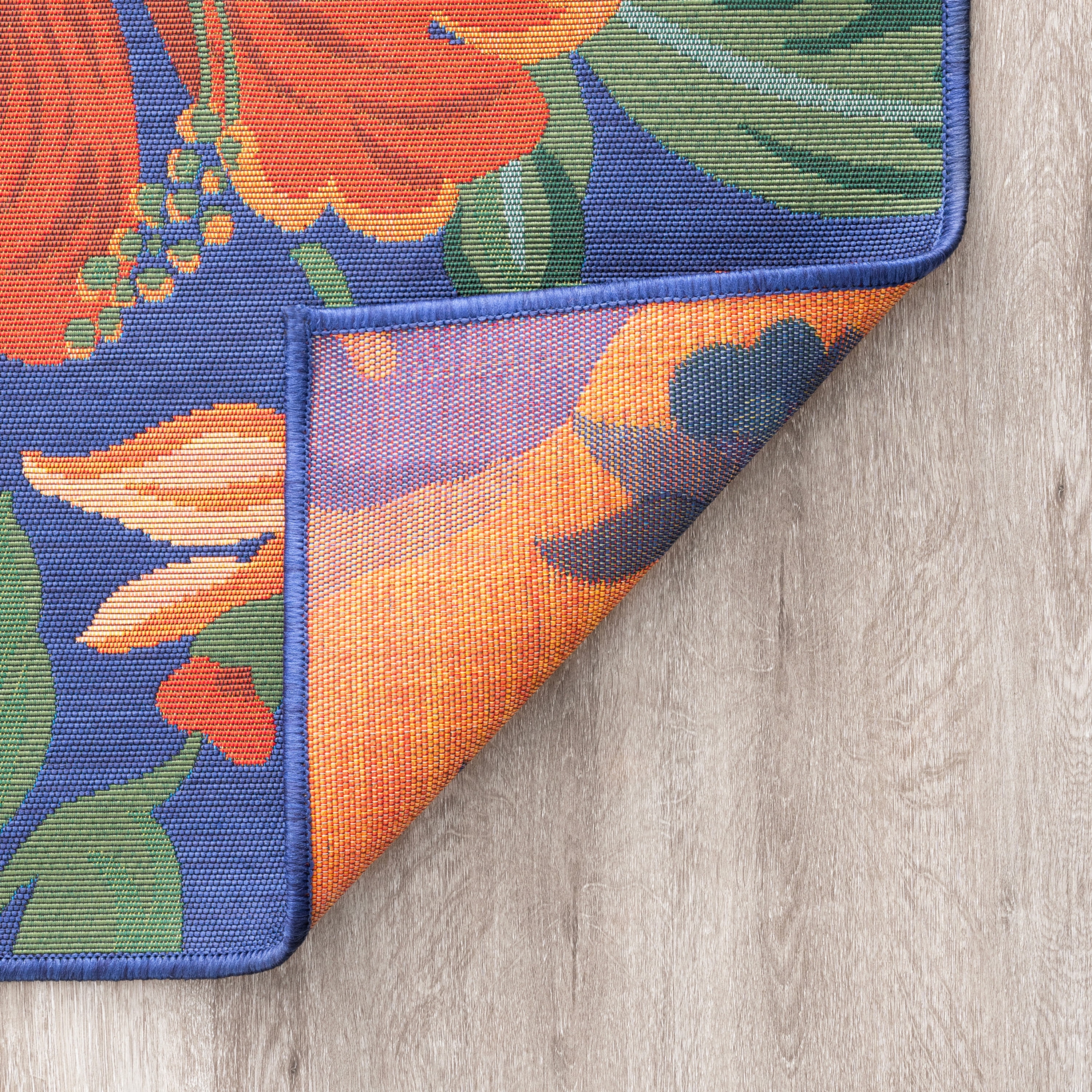 Stunning Transitional 2' x 3' Blue and Red Polypropylene Outdoor Area Rug