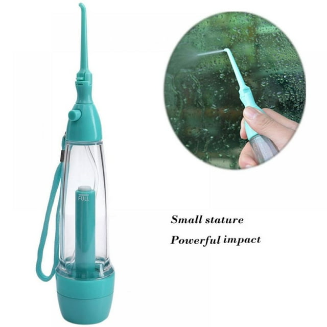 Manual Air Pressure Teeth Cleaner, Cordless Water Flosser, Portable Oral Irrigator in green ABS PVC material. The compact handheld device features a transparent water chamber and nozzle, designed for air pressure-based cleaning. Ideal for travel oral care, it uses manual operation to create a powerful water column for removing debris and food residues from hard-to-reach areas in the mouth. Includes a host, print head, and color box packaging.