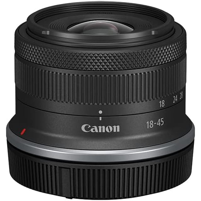 lente canon rf-s18-45mm f4.5-6.3 Negro, vista frontal centrada de lente zoom compacto para cámaras con montura RF, anillo de enfoque texturizado, marcas 18–45 mm visibles y logo Canon en el cuerpo.