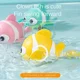 thumbnail image 4 of Juguetes de baño flotantes para niños pequeños, juguetes de baño de peces, payaso de natación, juguetes de cuerda para niños pequeños, bañera para bebés recién nacidos, 4 of 6