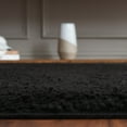 thumbnail image 4 of SAFAVIEH Rumi Blaire Solid Polyester Shag Area Rug, Black, 8' x 10', 4 of 7