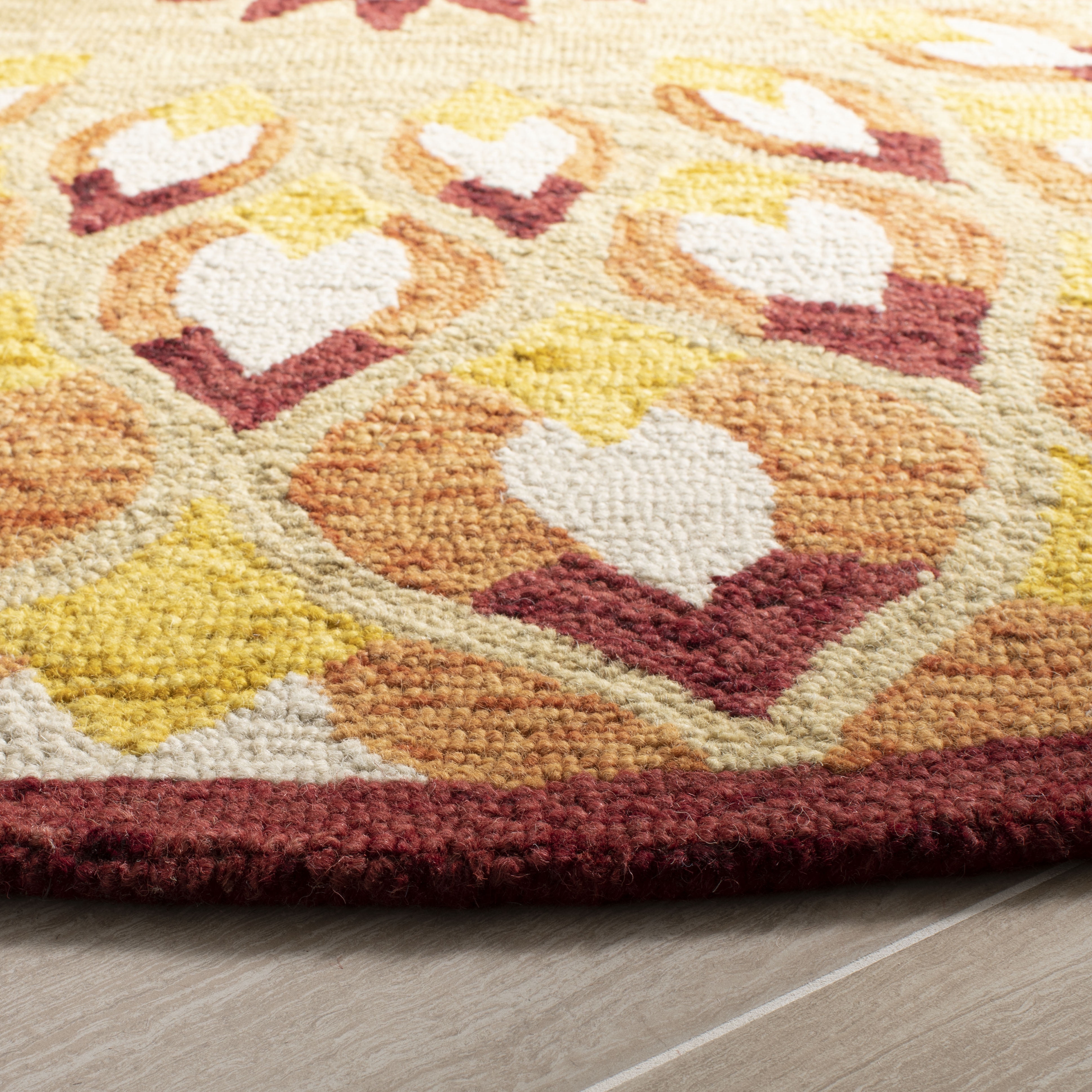 SAFAVIEH Novelty Rosalin Geometric Area Rug, Rust/Gold, 7' x 7' Round
