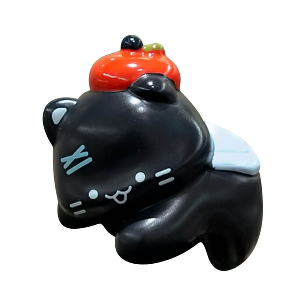 Figura decorativa de monitor posado con forma de bola de manzanas, gatos y carbn