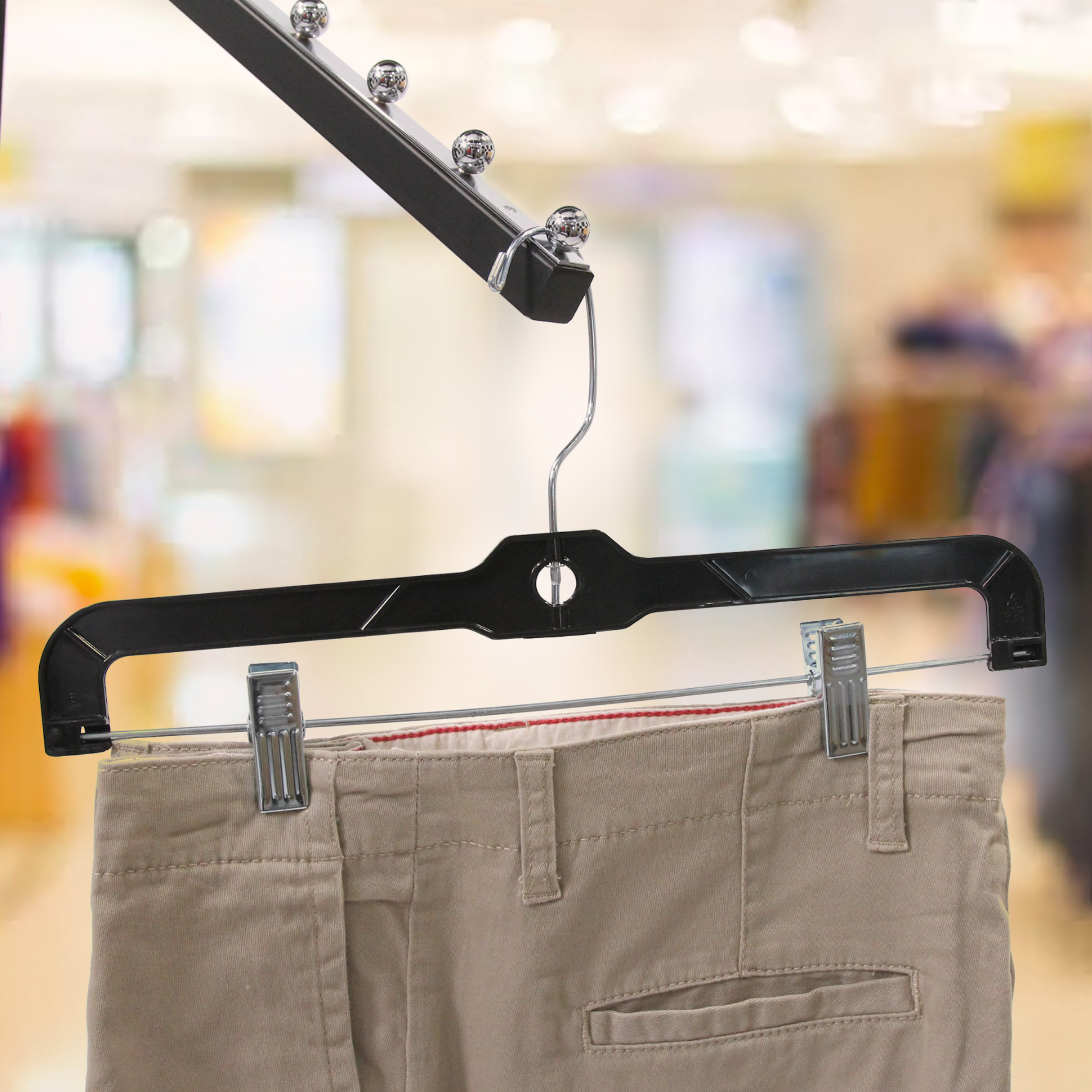SSWBasics 14-Inch Black Plastic Skirt and Pants Hangers - Pack of 20 with Chrome Swivel Hook  Padded Clips - Perfect for Retail and Home Use  Holds Up To 6 Pounds