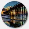 thumbnail image 1 of Designart 'Oceanside Pier at Evening' Landscape Photography Circle Metal Wall Art, 1 of 5