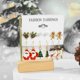 thumbnail image 4 of Juego de pendientes de botón navideños para mujer 2025, pendientes de aro con decoración de alce, árbol de Navidad, muñeco de nieve y luna, joyería para oreja perforada, regalo, 4 of 5