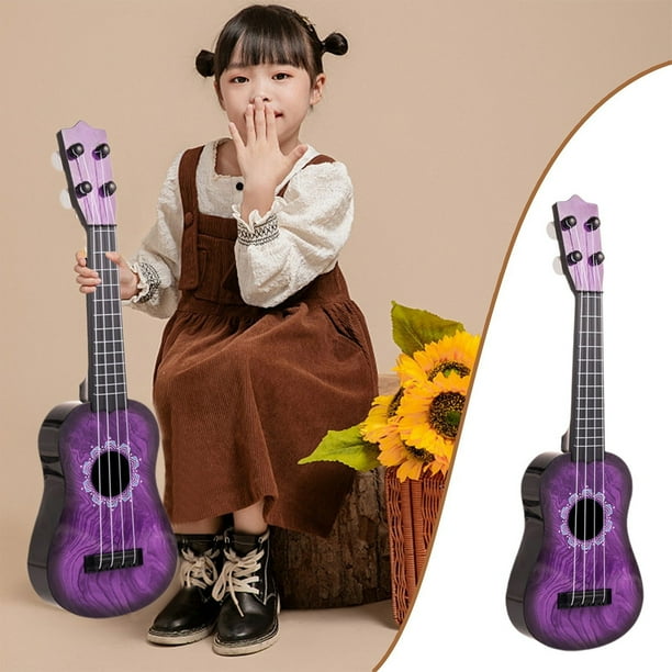 Guitarra de ukelele con patrón de hipopótamo | Instrumento de plástico jugable | Diseño de animales lindos | Selección de color aleatorio | Duradero | Aprendizaje temprano de la música | Tamaño de