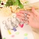 thumbnail image 5 of Llaveros de borlas Uxcell de 5 paquetes, anillos de llavero de borlas de 4" con campana para llaves, billeteras y bolsos, rojo rosa, 5 of 7