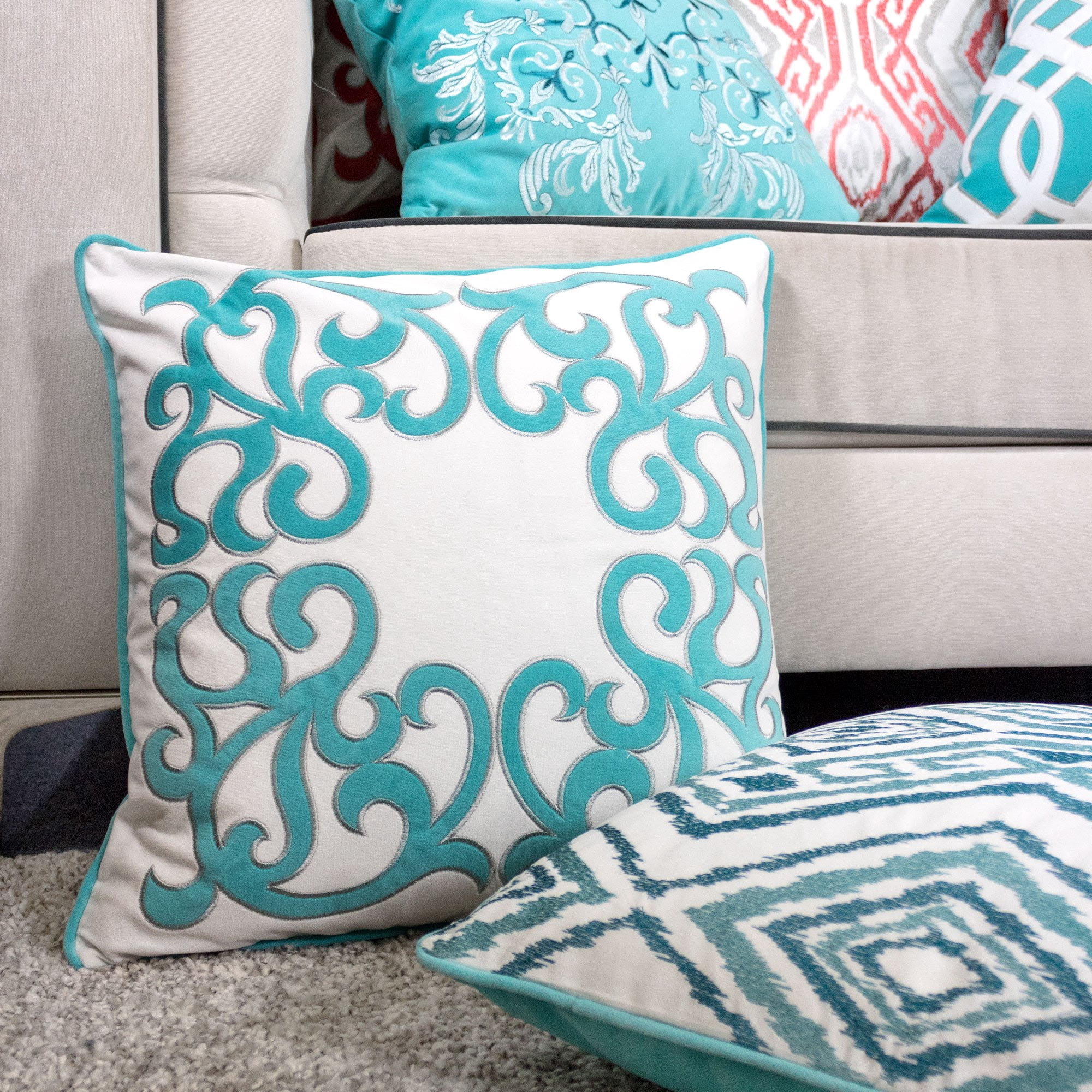 Jordan Turquoise Geometric Polyester 20 in. x 20 in. Throw Pillow