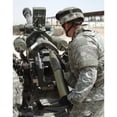 thumbnail image 2 of U.S. Army Soldier loads a 105mm artillery round into a M119 Howitzer Poster Print, 2 of 2