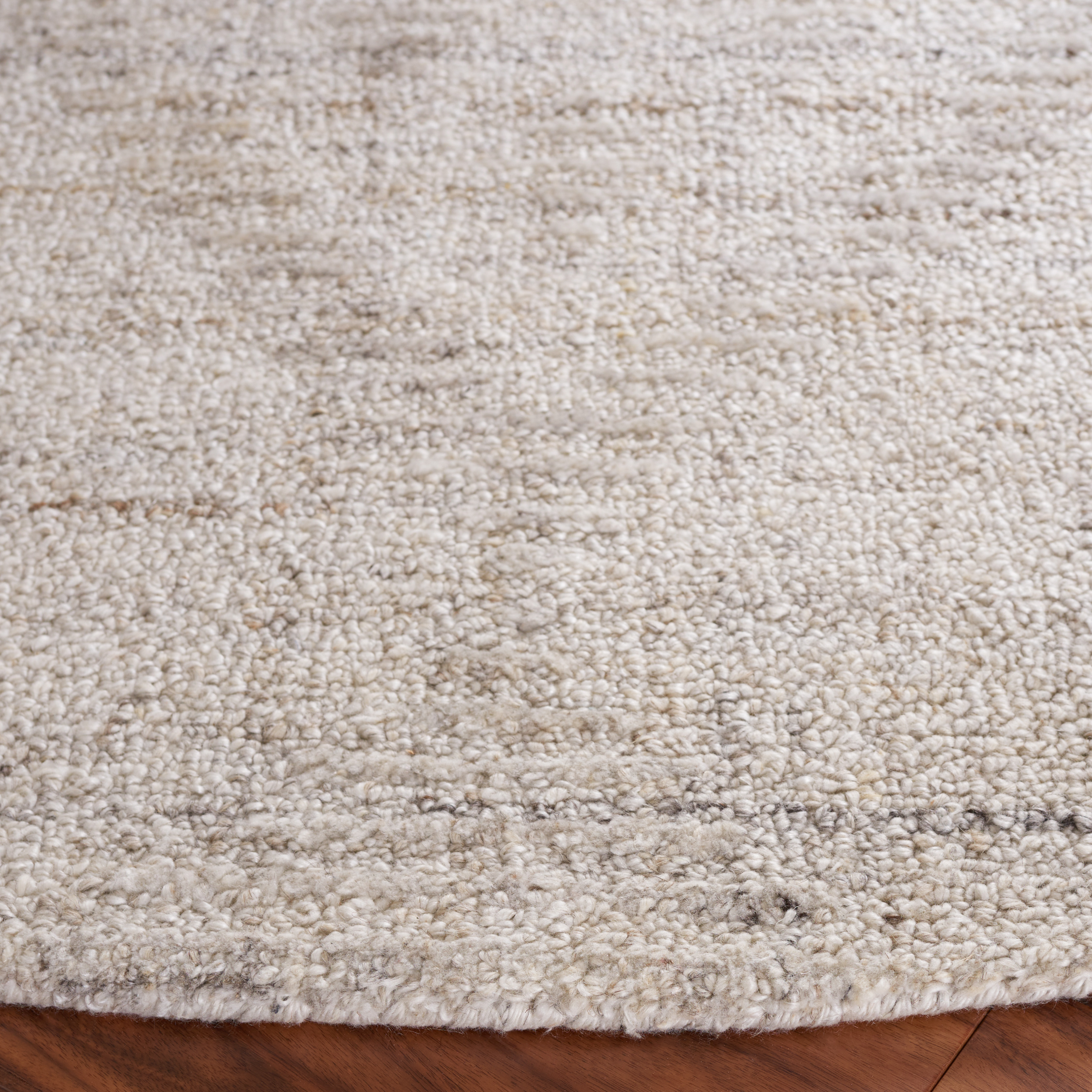 SAFAVIEH Abstract Janis Solid Polyester Area Rug, Ivory/Grey, 6' x 6' Round
