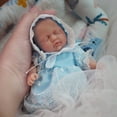 thumbnail image 2 of Muñeca pequeña de silicona Newtotlove de 7 cm con accesorios de alimentación, 2 of 5