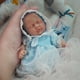 thumbnail image 2 of Muñeca pequeña de silicona Newtotlove de 7 cm con accesorios de alimentación, 2 of 5