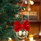 thumbnail image 4 of Adornos navideños con campanas de terciopelo rojo y lazos de hierro forjado para crear un ambiente festivo., 4 of 5