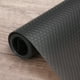 thumbnail image 1 of Forro de estante Uxcell 11.8" x 4.9 pies EVA antideslizante para cajones textura de malla circular negra, 1 of 7