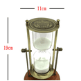 thumbnail image 2 of Reloj de arena vintage de 15 minutos, reloj de arena giratorio de 360 °, vidrio de latón de 15 minutos para el hogar, escritorio, oficina, decoración de bodas Adepaton ZJWJ296, 2 of 4