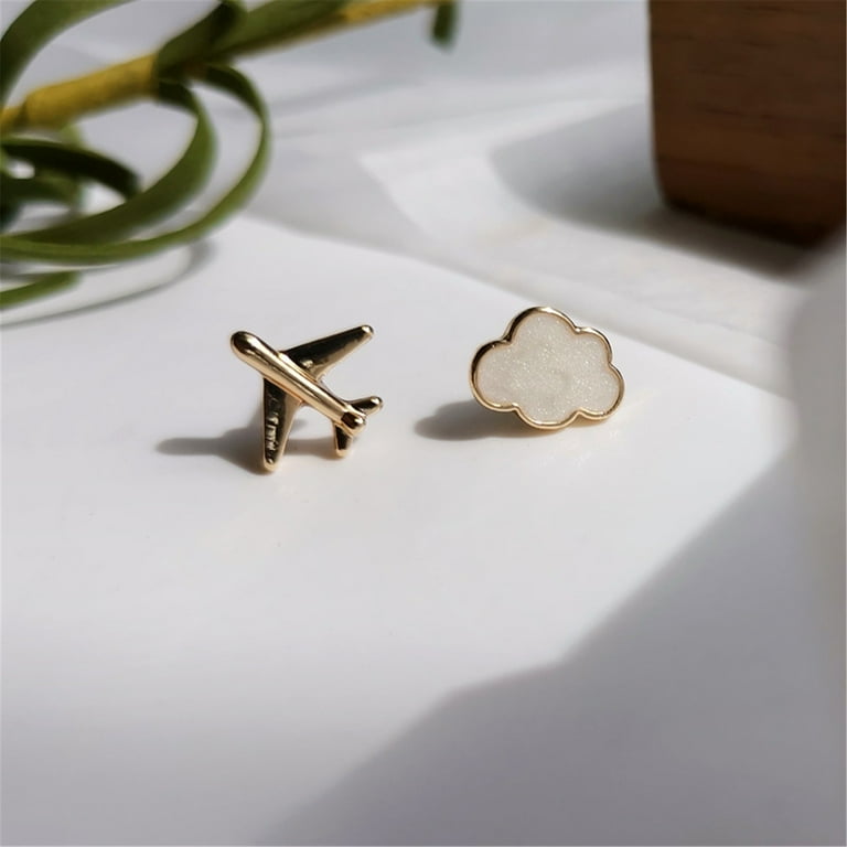 White gold shop airplane earrings