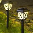 thumbnail image 1 of Paquete de 2 luces solares LED para exteriores, luces decorativas para paisajes, caminos, jardines, entradas, impermeables Rojo Verde, 1 of 5