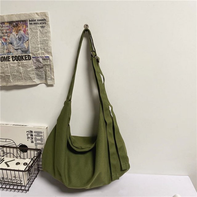 Bolso bandolera informal de lona con personalidad y correa para el hombro, sencillo y versátil