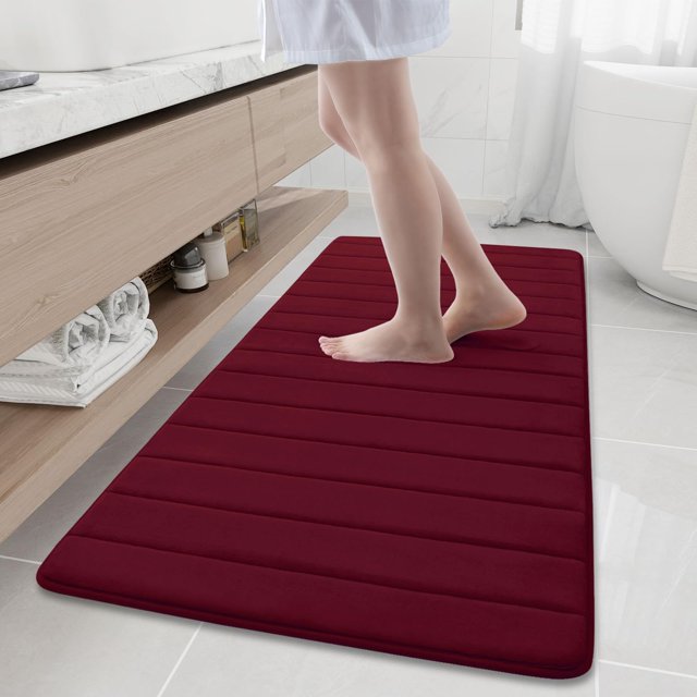 Alfombrilla de baño viscoelástica Buganda 60 x 60 cm, color burdeos