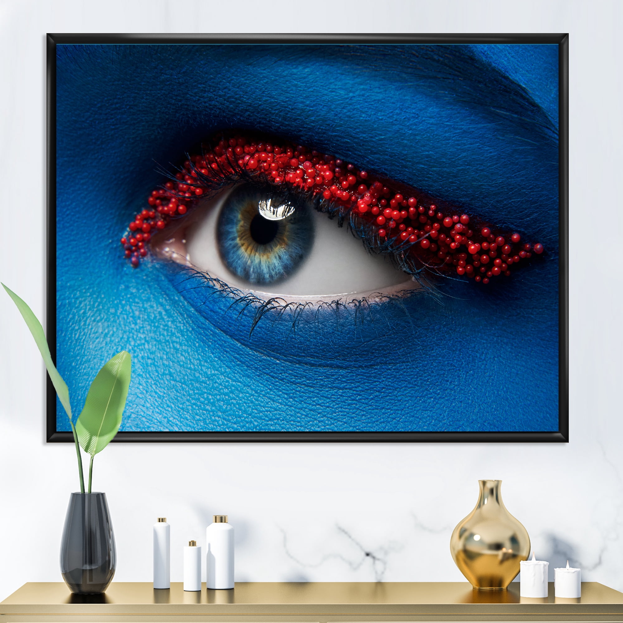 Designart 'Woman Eye With Blue Paint On Face & Red Balls' Modern Framed Canvas Wall Art Print