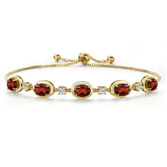 Gem Stone King 18K Yellow Gold Plated Silver Red Garnet Bracelet for Women | 4.61 Cttw | Gemstone January Birthstone | Oval 7X5MM | Fully Adjustable 9 inch