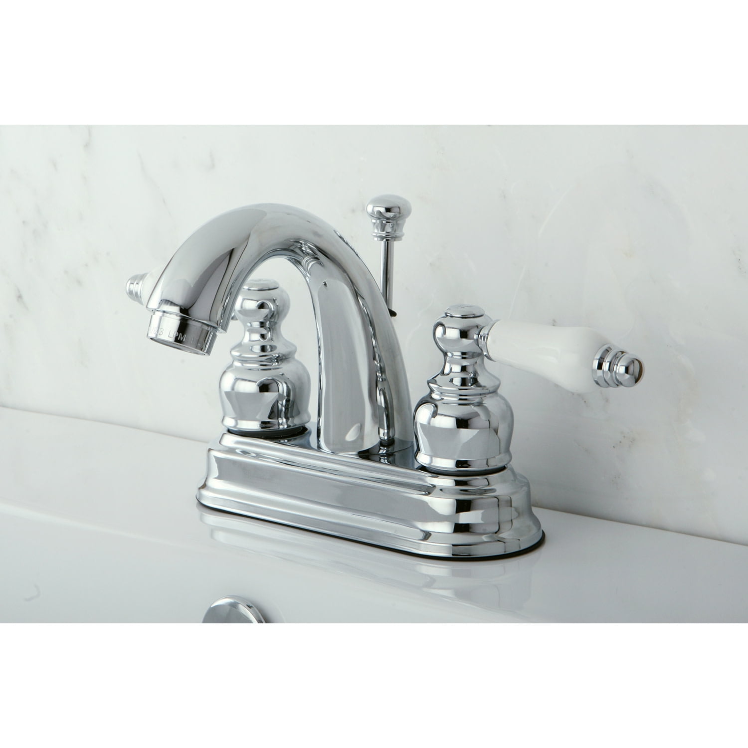 Kingston Brass Restoration Two Handle 4" Centerset Lavatory Faucet with Retail Pop-up