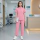 thumbnail image 1 of Conjunto de uniforme de enfermera: blusa y pantalón quirúrgicos para el sector sanitario, cosmetología y peluquería de mascotas. L rosa, 1 of 8