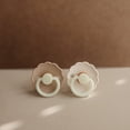 thumbnail image 4 of FRIGG Daisy Night Natural Rubber Baby Pacifier 2-Pack, 0-6 Months, Croissant/Cream, 4 of 6