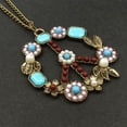 thumbnail image 4 of Collar con cuentas y flores con signo de la paz y piedras preciosas de color turquesa, 4 of 5