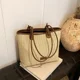 thumbnail image 5 of Bolso tejido de paja versátil de gran capacidad para mujer, nuevo bolso de playa tejido de estilo extranjero de moda informal de 2024, bolso de viaje para el trabajo, 5 of 5