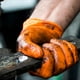 thumbnail image 5 of Guantes desechables TitanFlex ThorGrip Heavy Duty de nitrilo naranja, 5 of 9