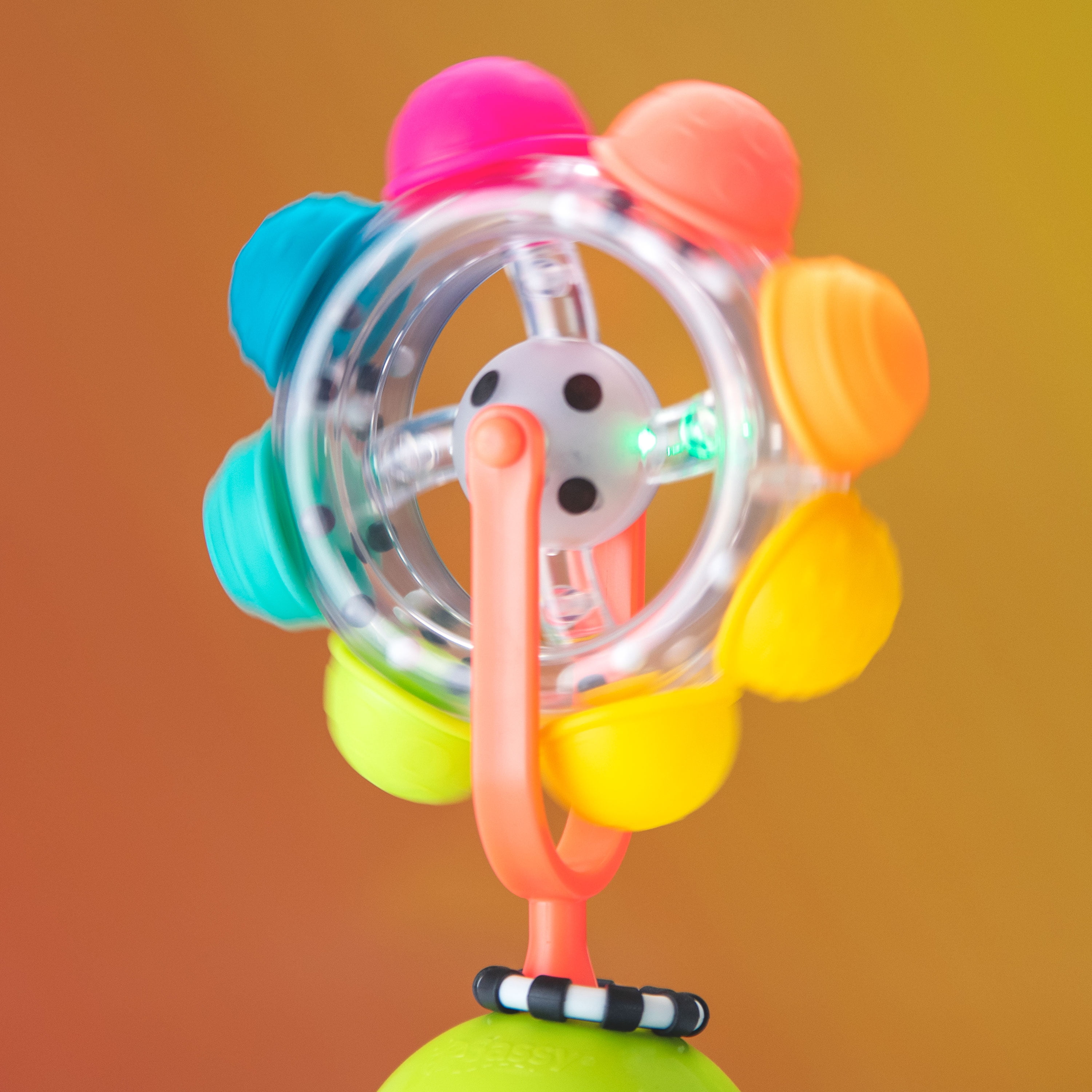 Sassy Light-up Rainbow Reel Spinning Developmental Suction Cup Baby High Chair Tray Toy | age group 6+ Months