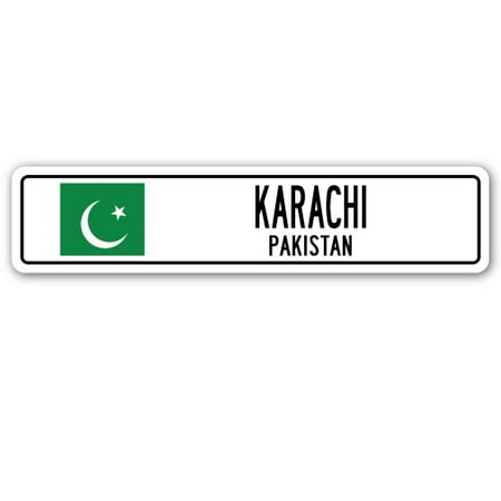 KARACHI, PAKISTAN Street Sign Pakistani flag city country road wall