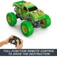 thumbnail image 4 of Hot Wheels Monster Trucks RC Toy, Gunkster con control remoto a escala 1:15, brilla en la oscuridad y tiene neumáticos de acción todoterreno con capacidad todoterreno, 4 of 5
