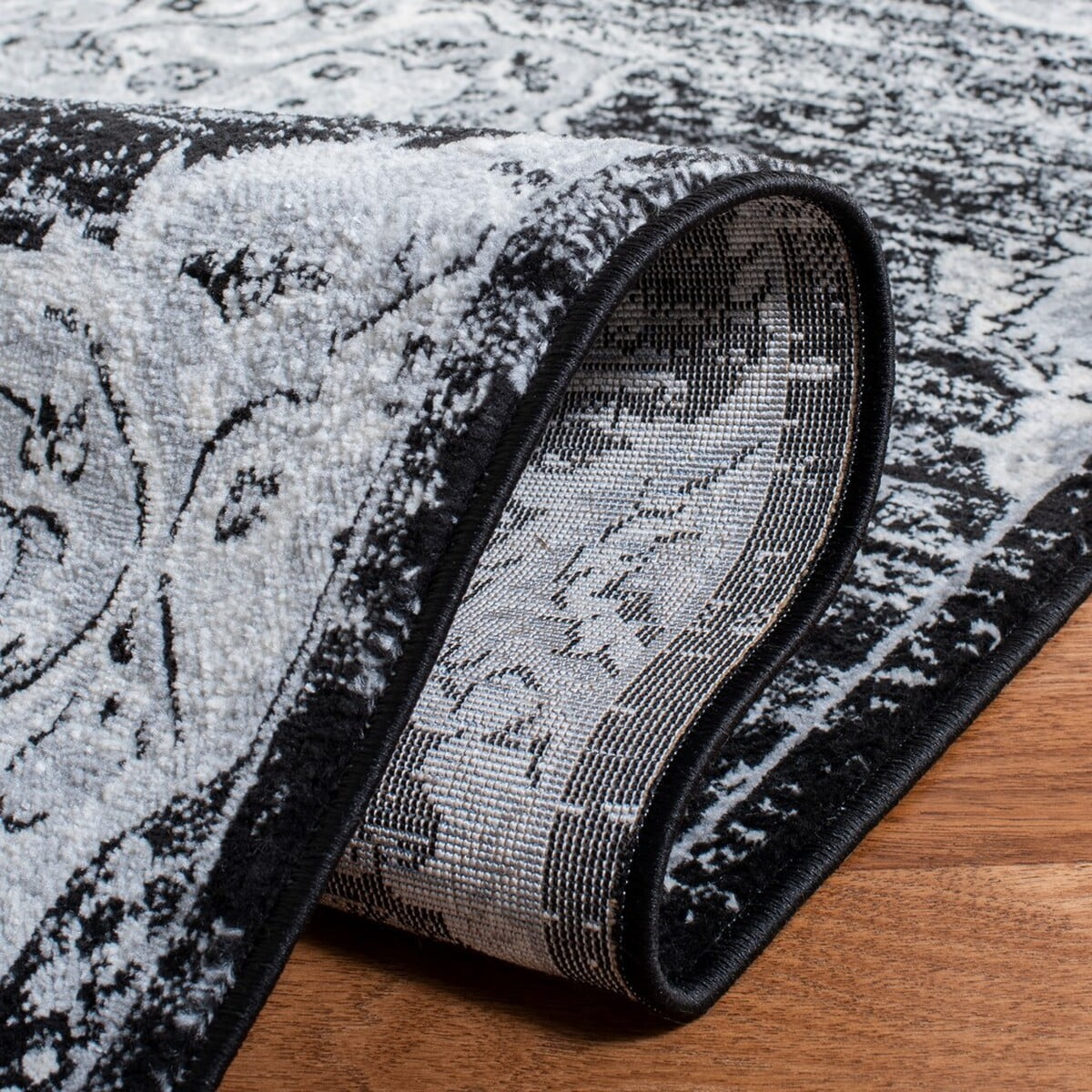 SAFAVIEH Brentwood Dimitri Floral Bordered Area Rug, 5'3" x 7'6", Black/Grey
