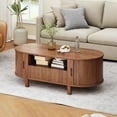 thumbnail image 6 of ONBRILL 47.2 Inch Oval Coffee Table with Storage, Mid Century Modern Coffee Table with Drawer, Center Table with Sliding Door and Wood Fluted Handle for Living Room, Walnut, 6 of 7