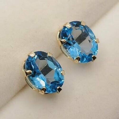 4Ct Oval Cut Blue Topaz Solitaire Women's Stud Earrings 14K Yellow Gold Finish
