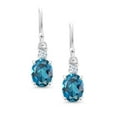thumbnail image 2 of Gem Stone King 10K White Gold London Blue Topaz and White Created Sapphire Dangle Earrings for Women (2.70 Cttw, Gemstone Birthstone, Oval 8x6mm), 2 of 5