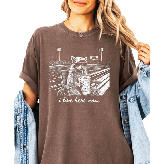 I Live Here Now Funny Raccoon Football Shirt for Women Game Day Tailgate Tee for Football Mom Espresso Shirt Large